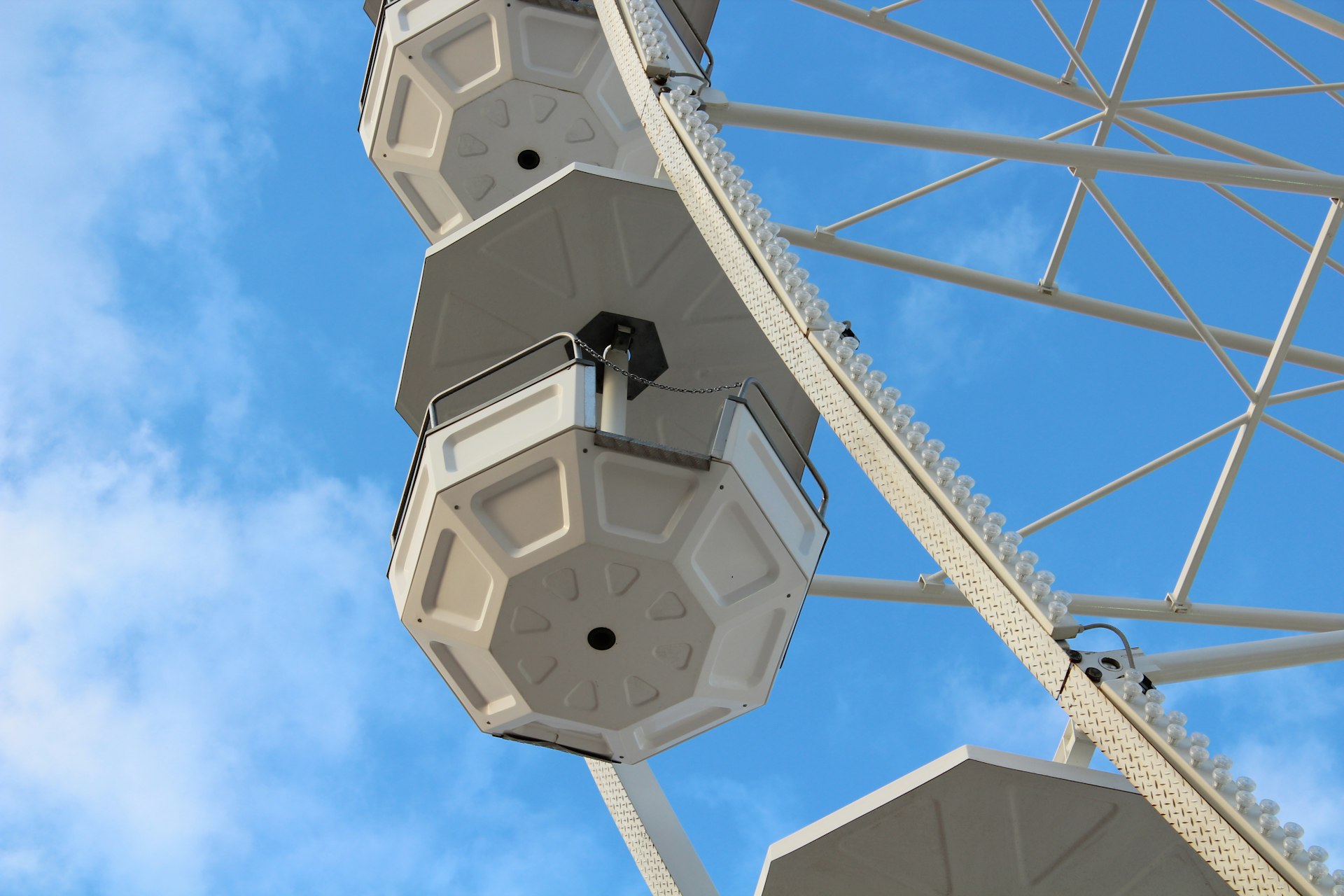 a ferris wheel with a blue sky in the background